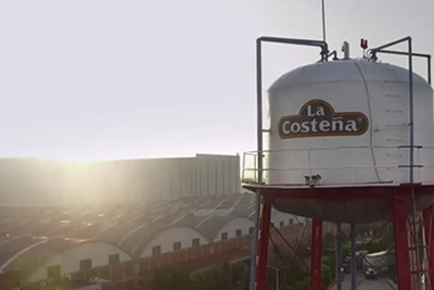 Sunrise with water tower in foreground